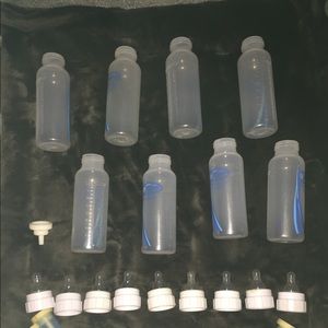Lot of 8 dr brown bottles with all accessories